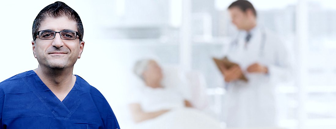 Professor Toufic El-Khoury in theatre scrubs on a hospital ward